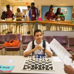 TMA male student with chess board
